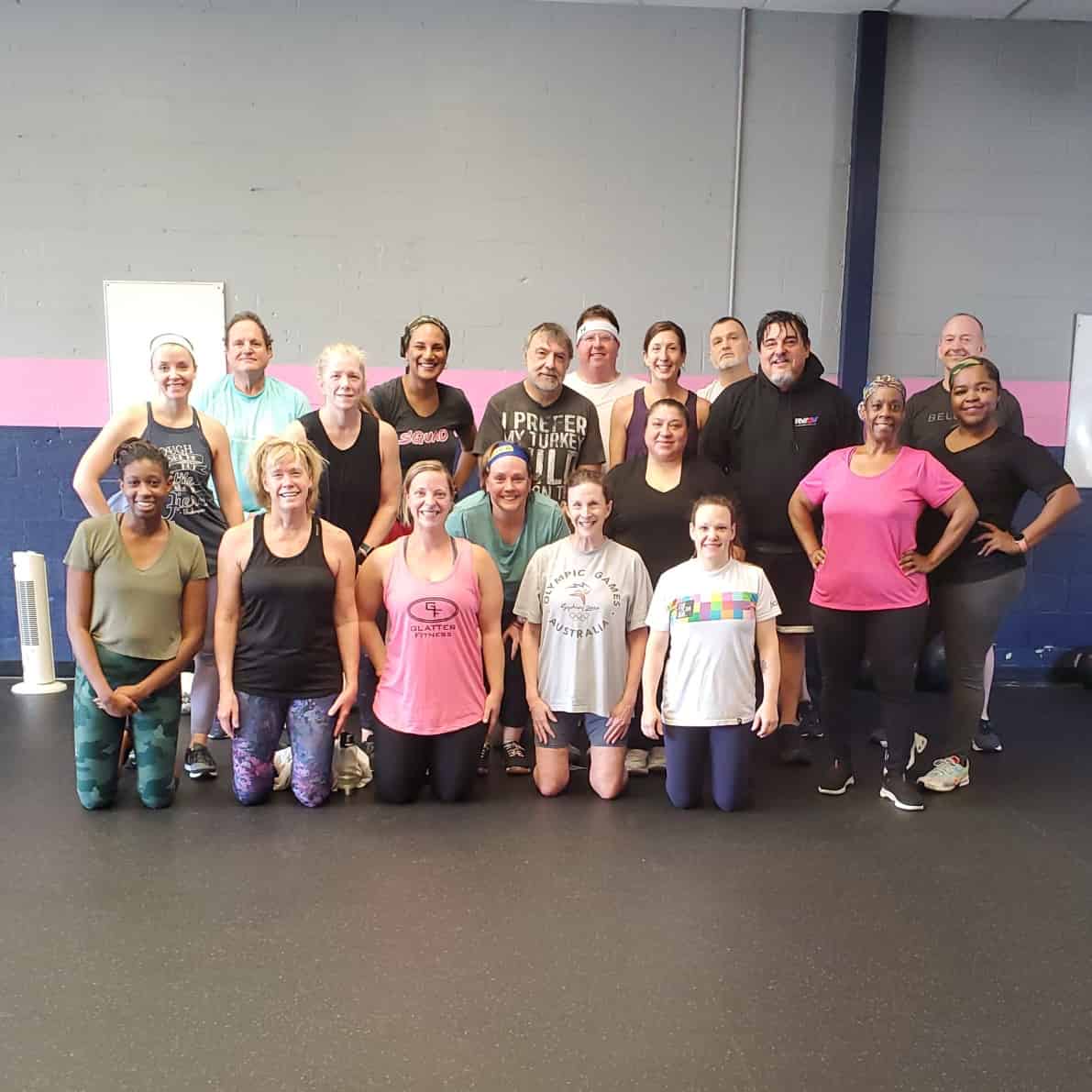 Diverse group of happy people after a fitness class at a Richmond gym